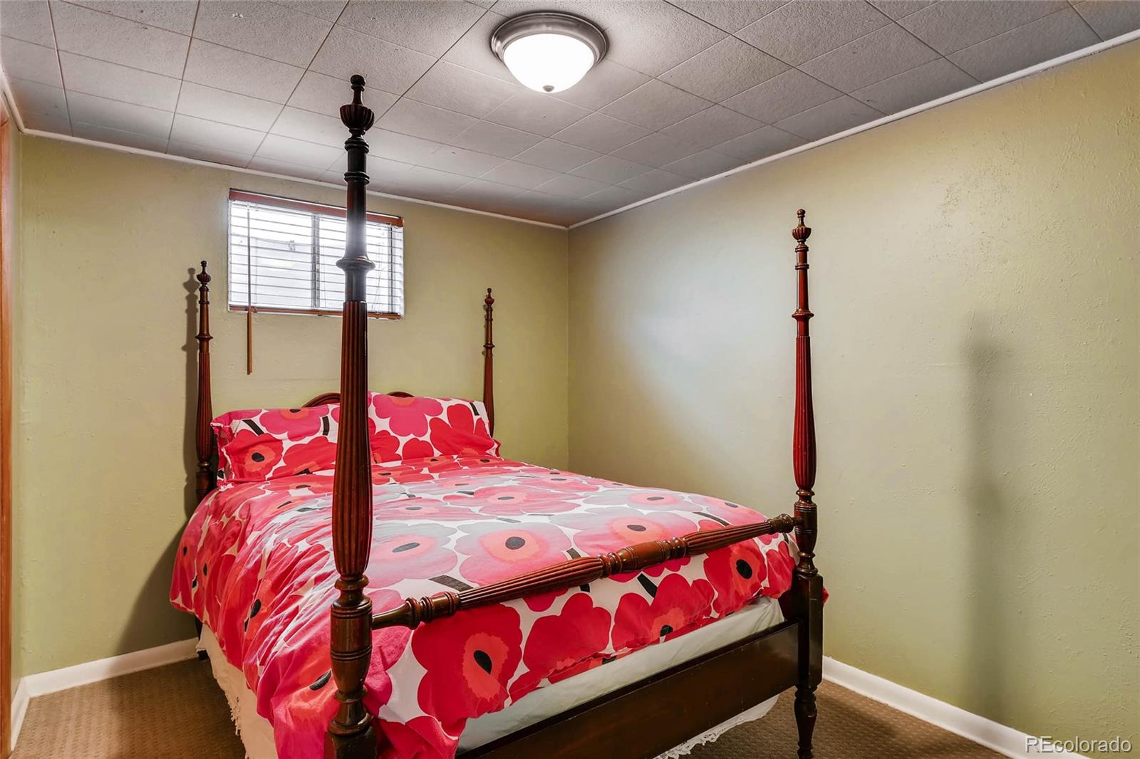 859 South Hudson Street Denver, CO 80246 - Photo 23 of 34 a bedroom with a bed and window