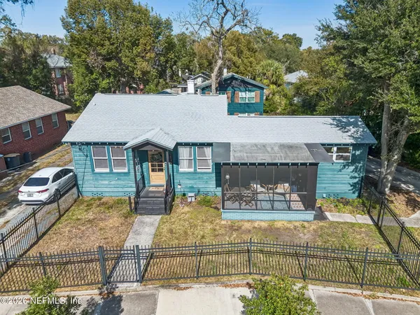a front view of a house with glass windows