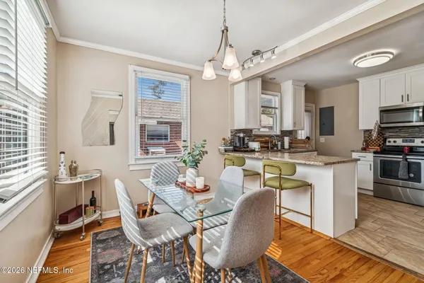 a bed room with a bed and a book shelf