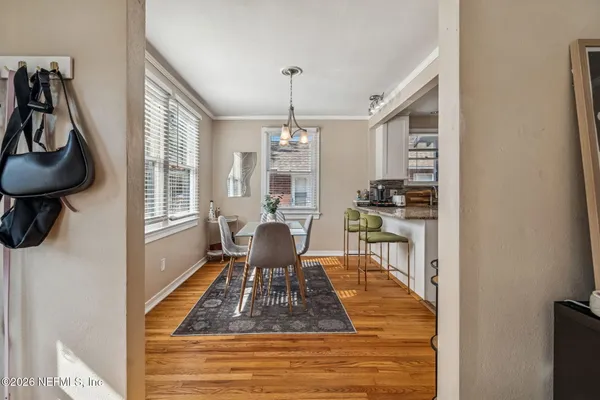 a workspace with furniture and wooden floor