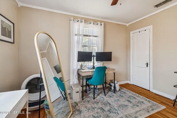 a view of a hallway with washer and dryer