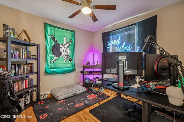 a kitchen with a stove and a microwave