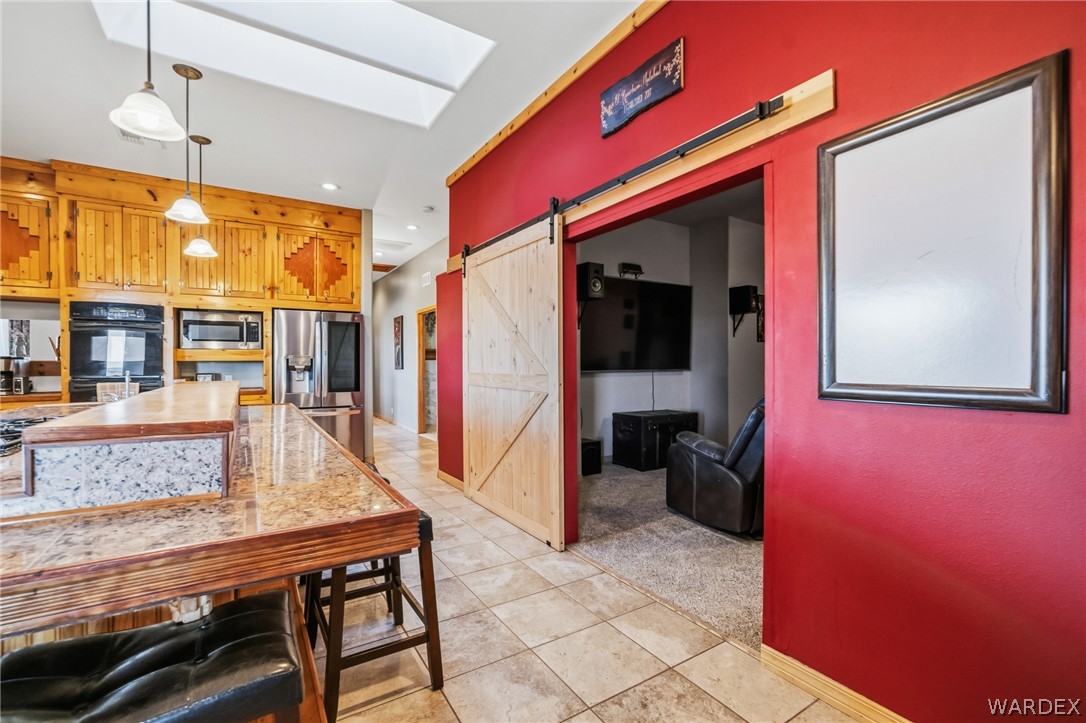 11275 North Benjamin Road Kingman, AZ 86401 - Photo 18 of 99 View of entrance to theater room off the kitchen