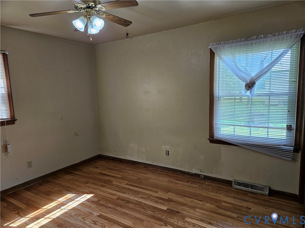 13336 Ladysmith Road Ruther Glen, VA 22580 - Photo 25 of 27 Spare room with wood finished floors and ceiling f