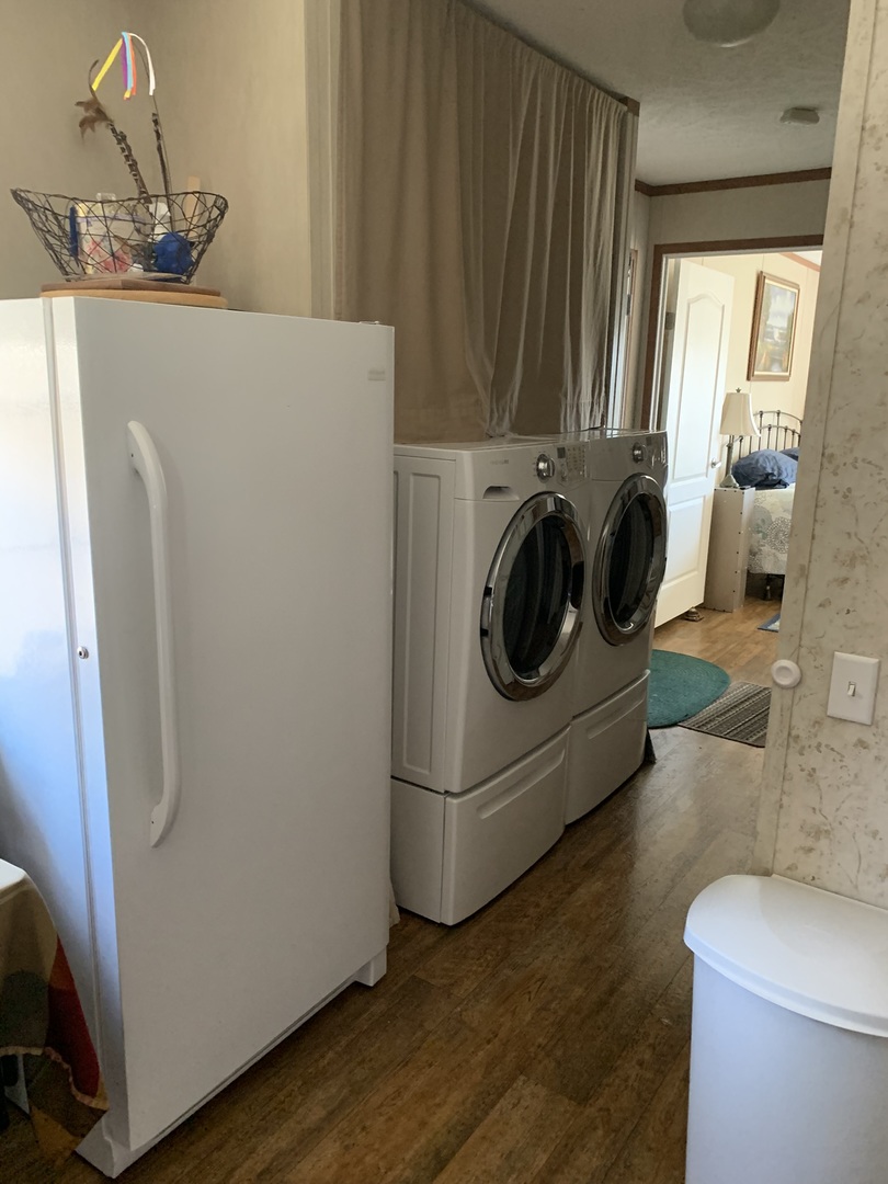 18 Troy Court Bloomington, IL 61701 - Photo 11 of 17 a utility room with wooden floor washer and dryer