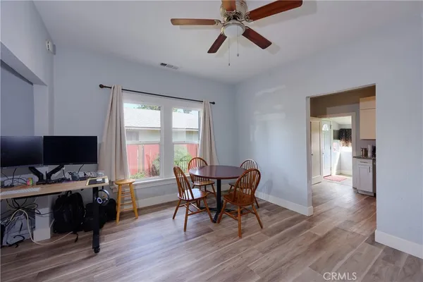 a workspace with furniture and a window