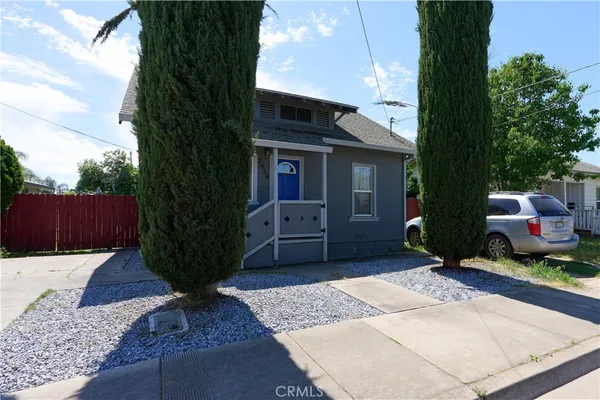 a house view with a garden space