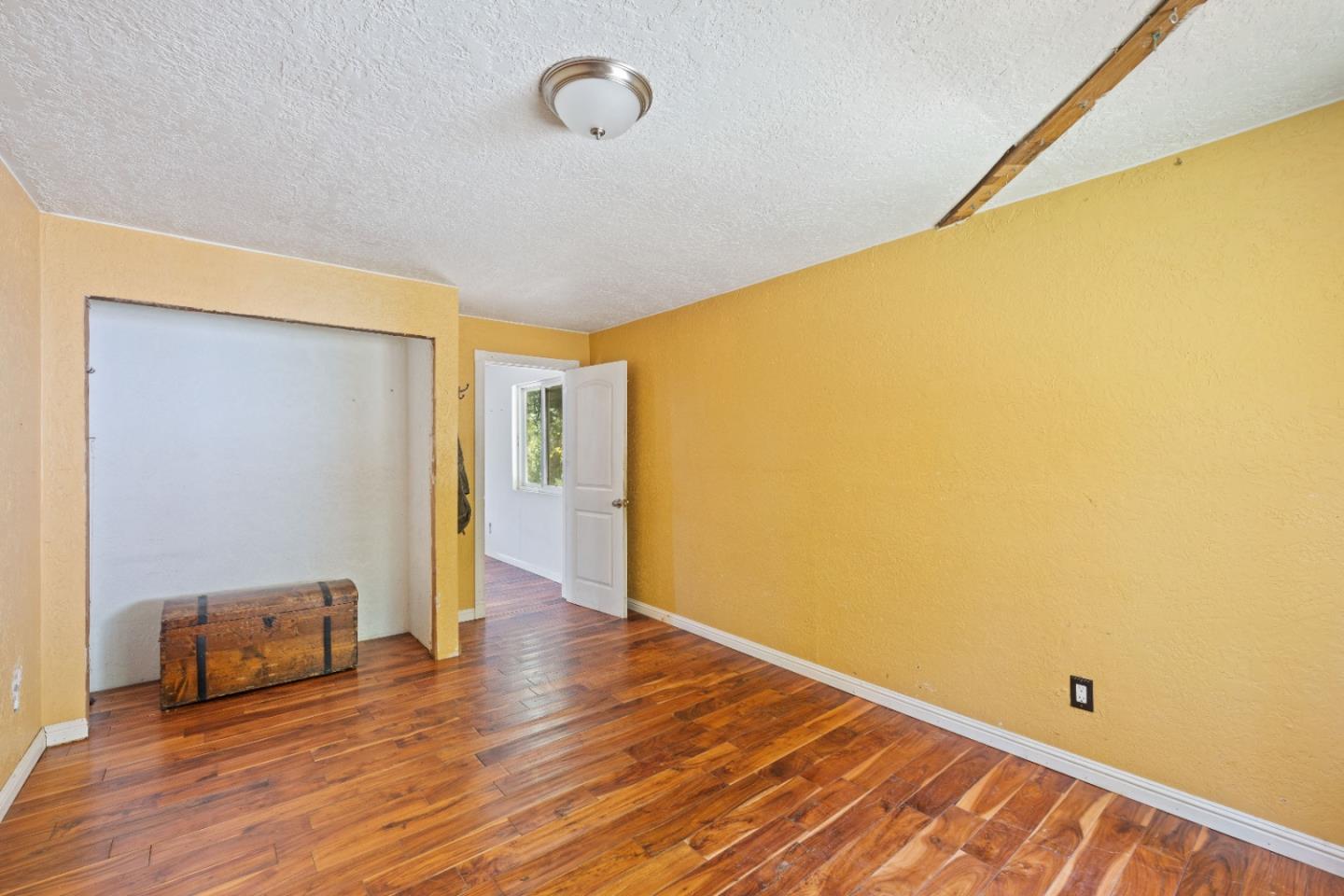 12 Doeg Road Boulder Creek, CA 95006 - Photo 4 of 19 a view of a room with wooden floor