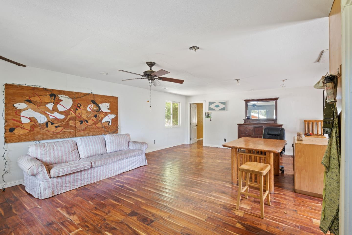 12 Doeg Road Boulder Creek, CA 95006 - Photo 5 of 19 a living room with furniture and a wooden floor