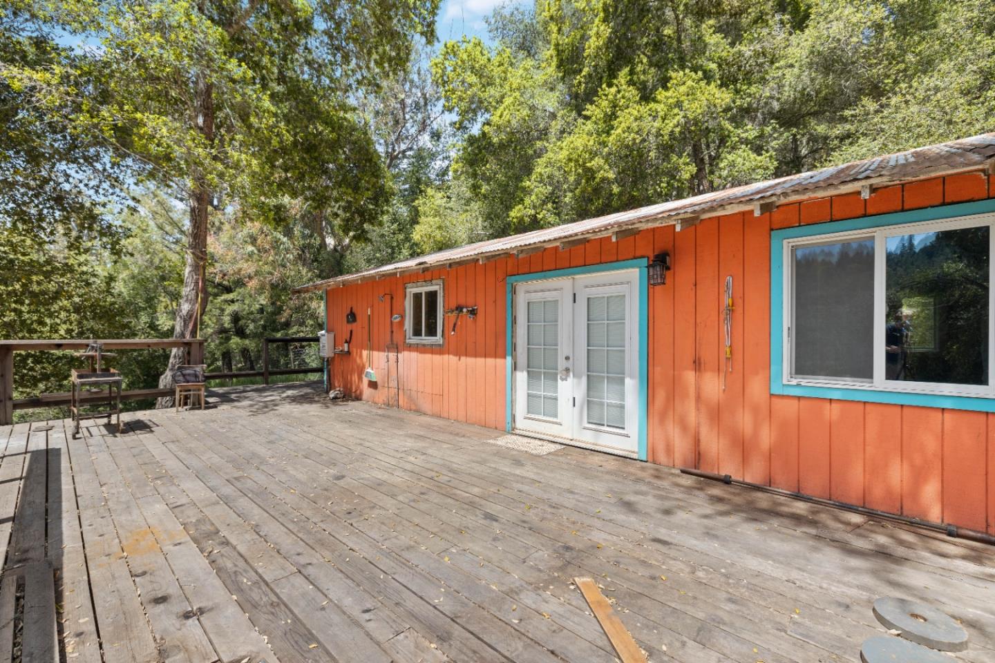 12 Doeg Road Boulder Creek, CA 95006 - Photo 6 of 19 a backyard of a house with seating space