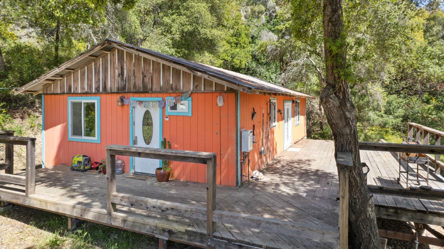 12 Doeg Road Boulder Creek, CA 95006 - Photo 7 of 19 a front view of a house with trees