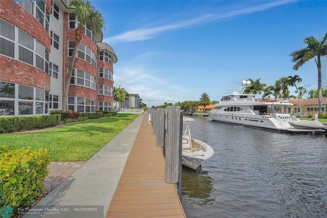 a view of a lake with a house