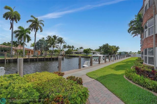 a view of a lake with a house