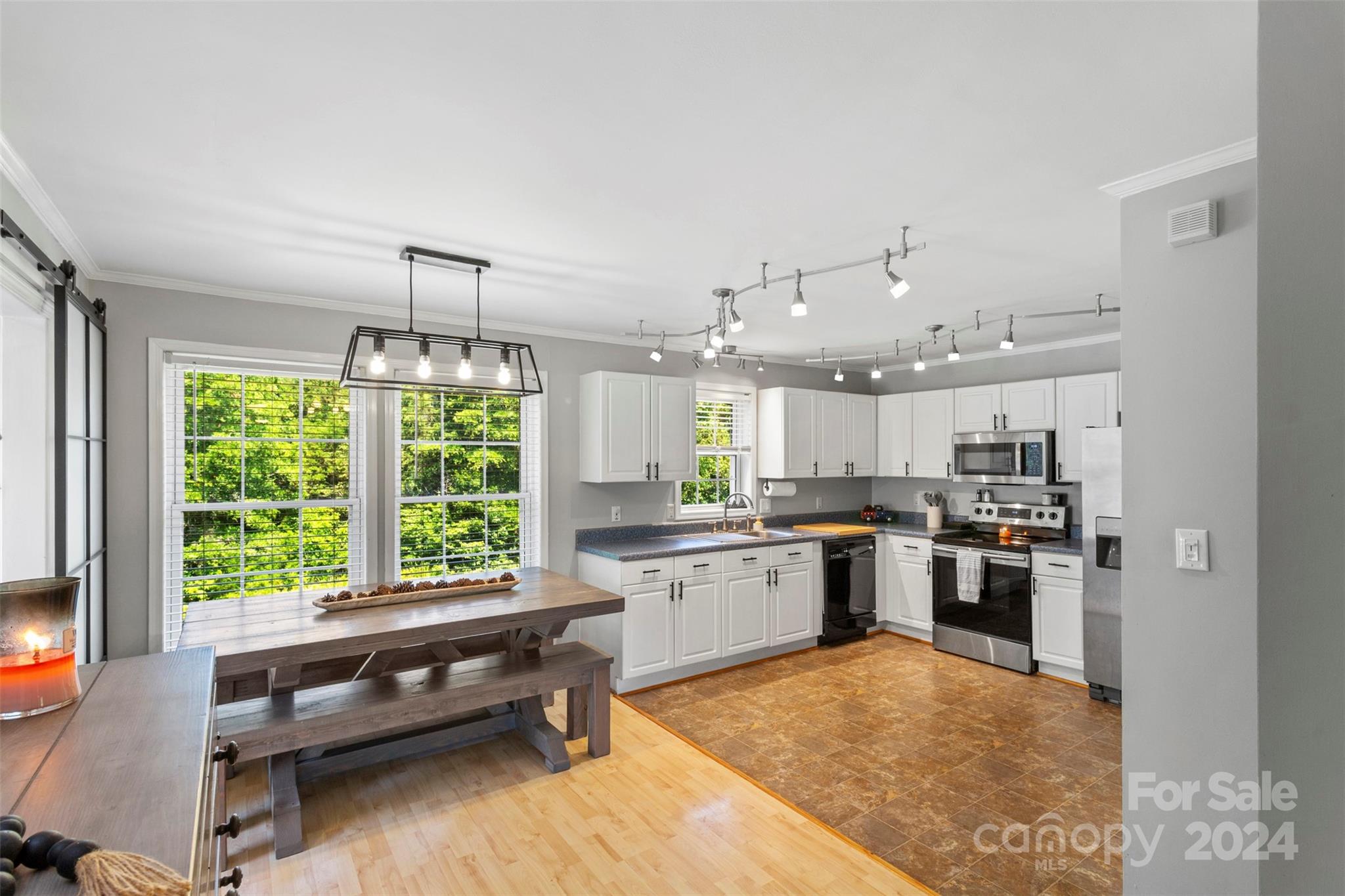 852 Langley Drive Chester, SC 29706 - Photo 12 of 35 a kitchen with kitchen island granite countertop lots of counter top space and stainless steel appliances