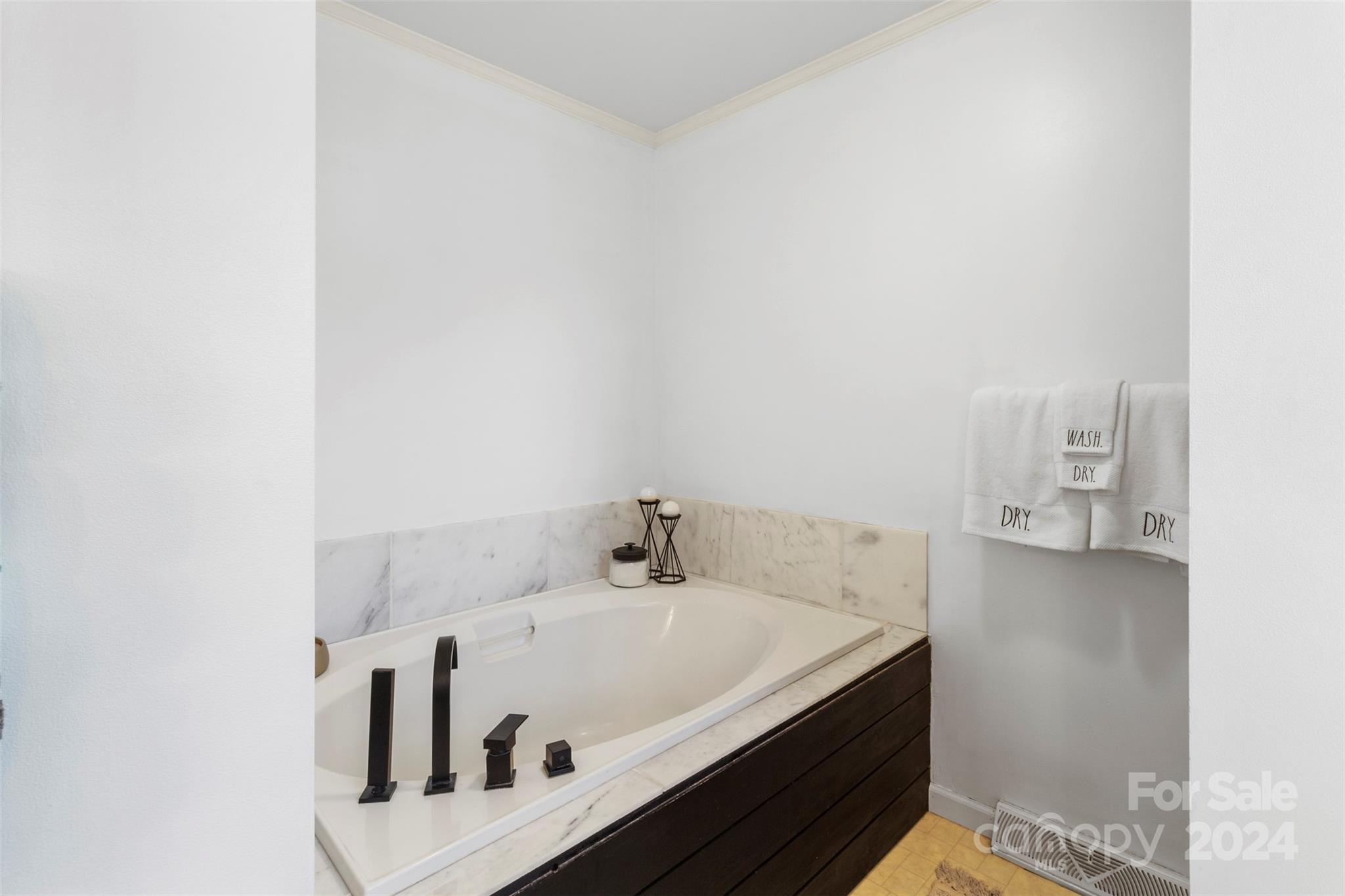 852 Langley Drive Chester, SC 29706 - Photo 23 of 35 a bathroom with a tub and sink