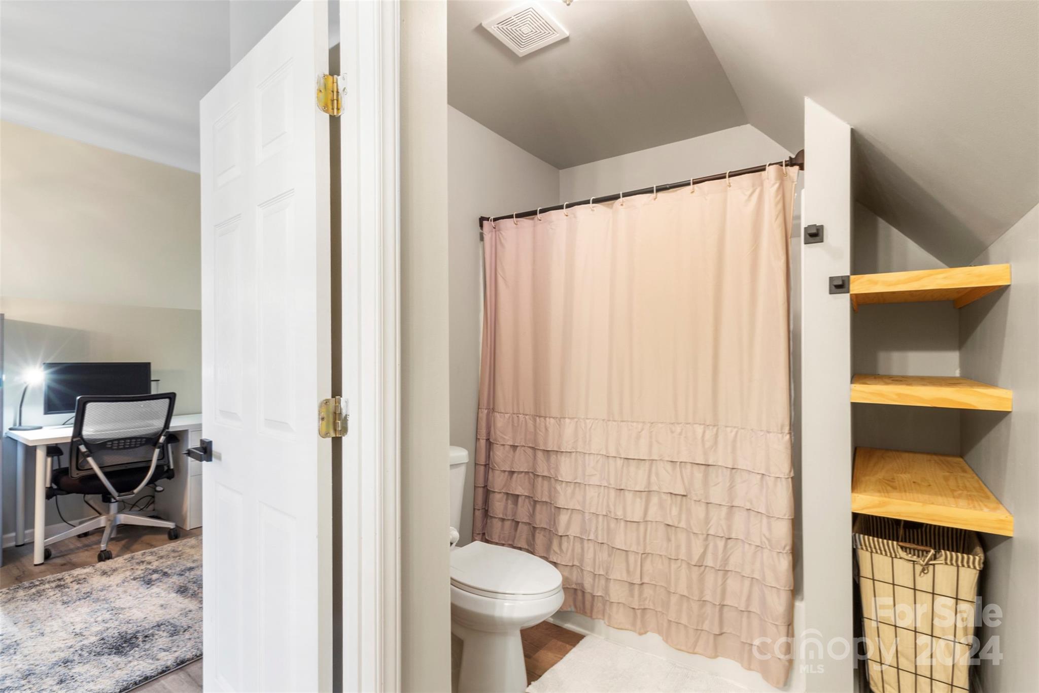 852 Langley Drive Chester, SC 29706 - Photo 26 of 35 a bathroom with a toilet and a shower