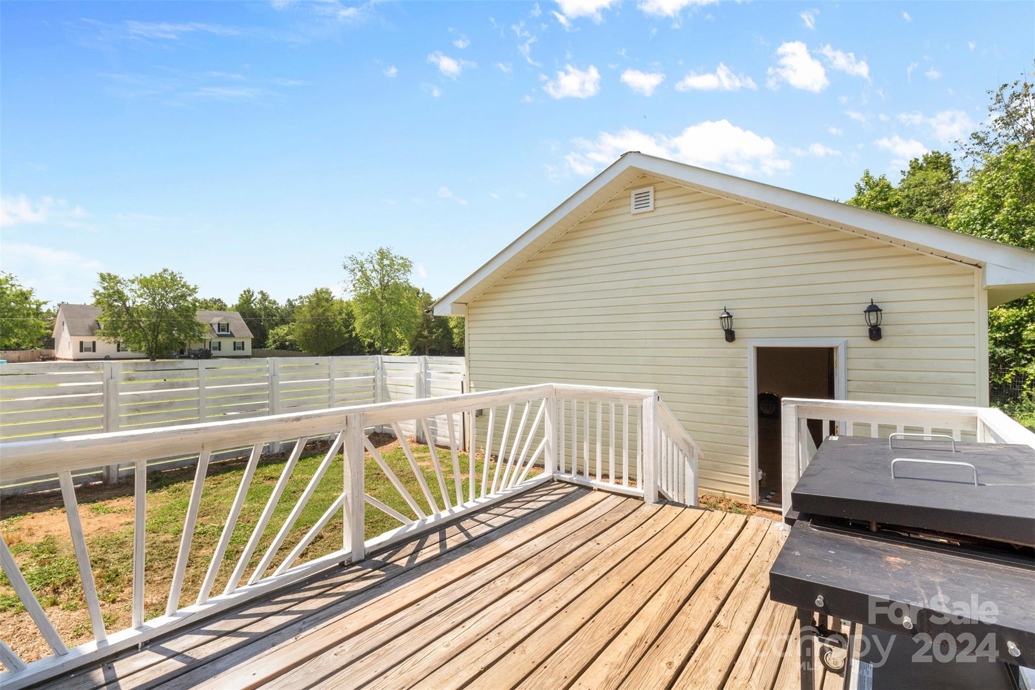 852 Langley Drive Chester, SC 29706 - Photo 3 of 35 a view of balcony with wooden floor and seating space