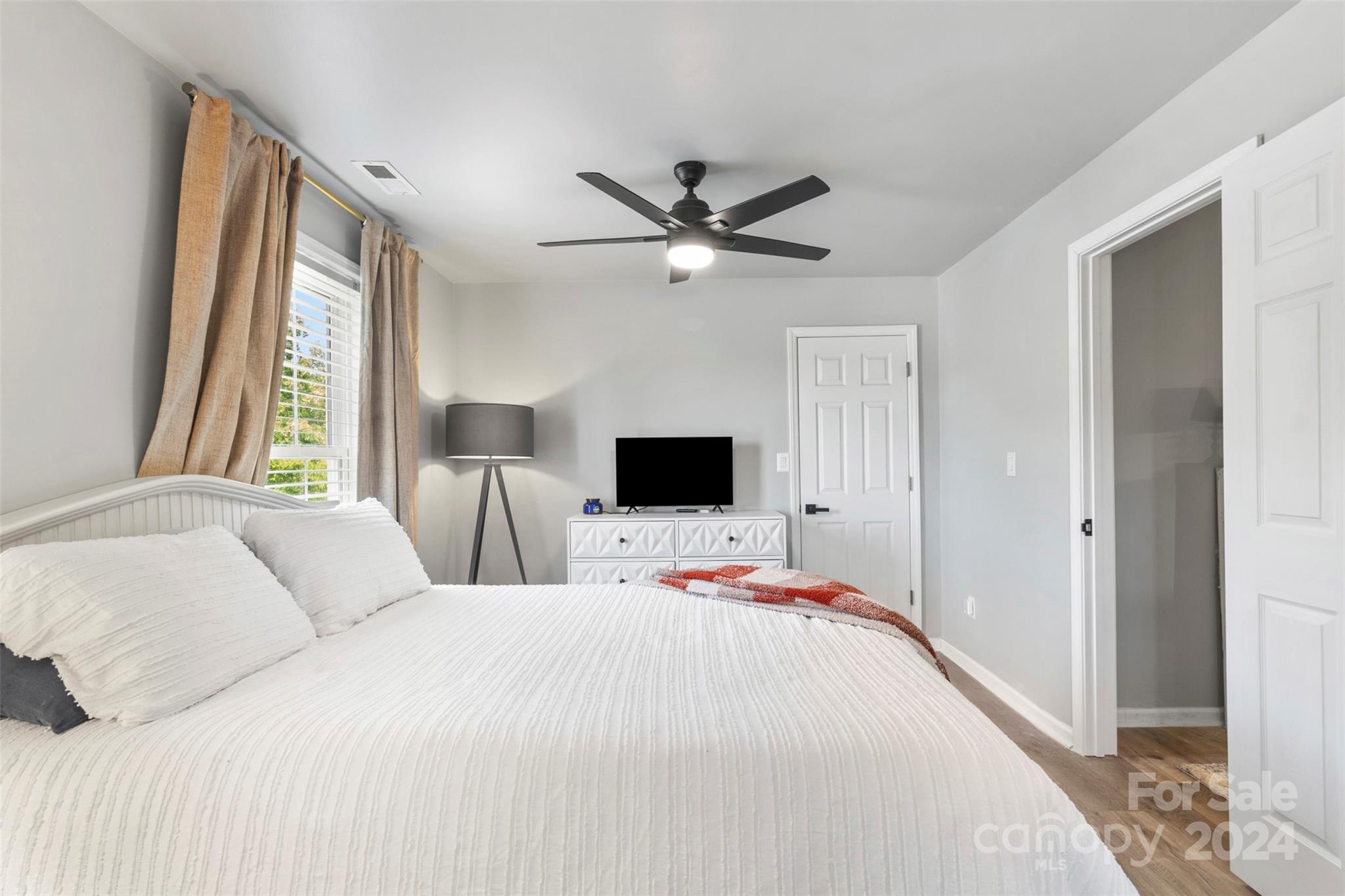 852 Langley Drive Chester, SC 29706 - Photo 32 of 35 a bedroom with a bed and a flat screen tv