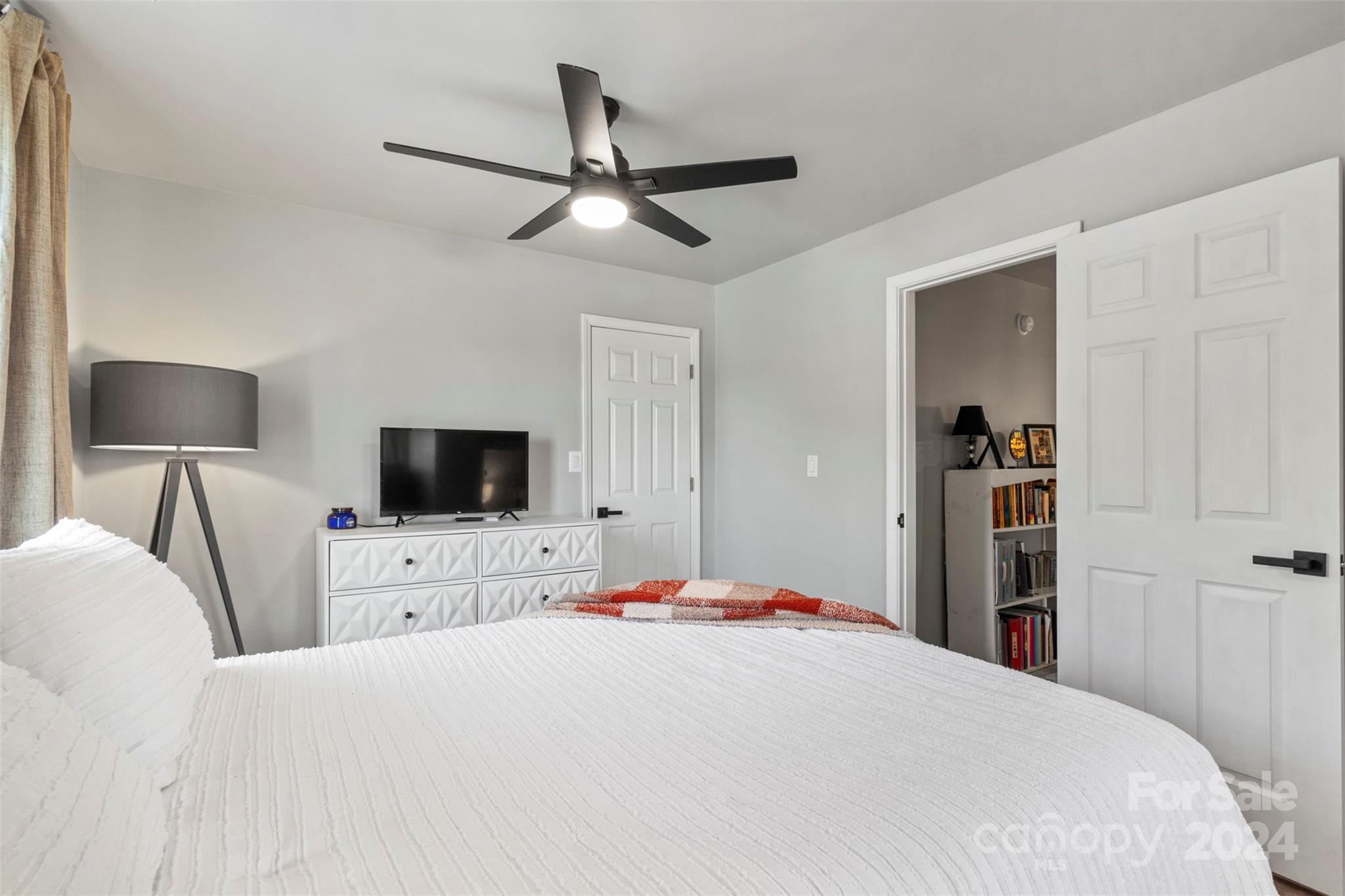 852 Langley Drive Chester, SC 29706 - Photo 33 of 35 a bedroom with a bed and a flat screen tv