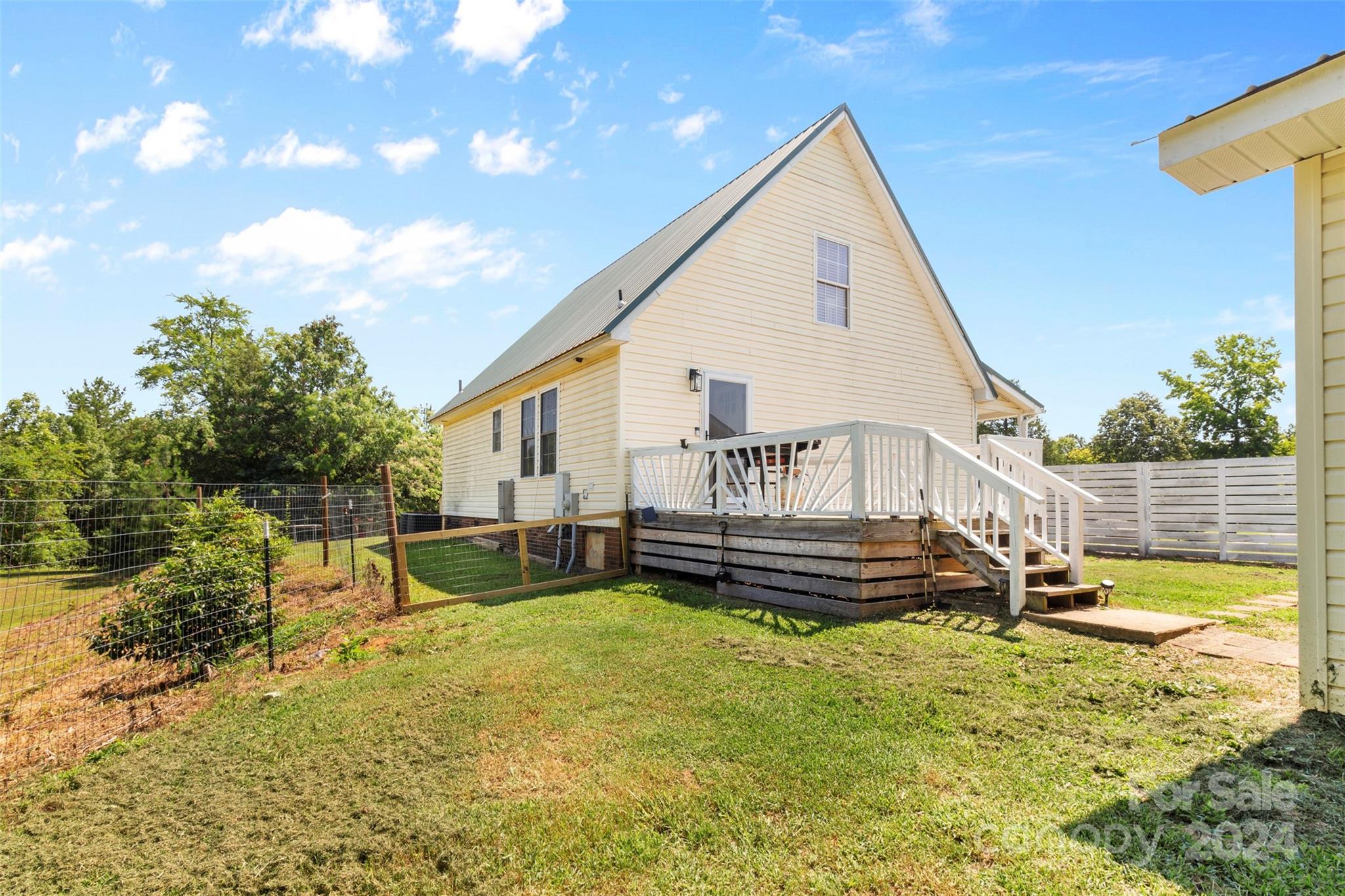 852 Langley Drive Chester, SC 29706 - Photo 4 of 35 a view of a house with pool and chairs