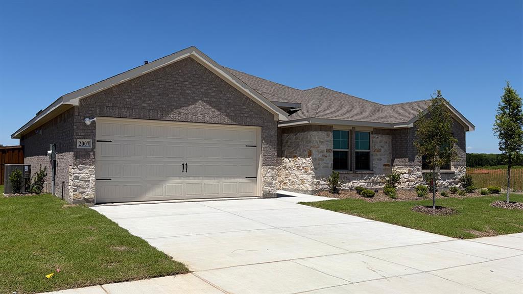 2007 Reveille Way Terrell, TX 75160 - Photo 2 of 31 a front view of house with yard and green space