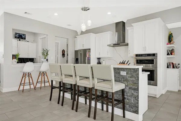a view of a dining room with furniture