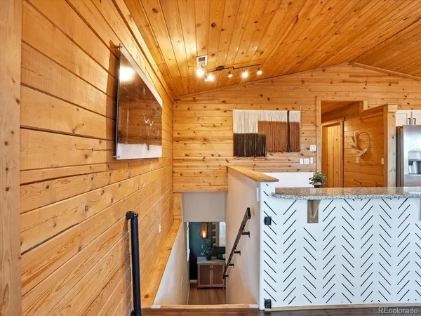 a view of a living room and dining room