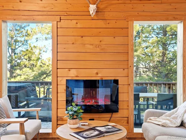 a kitchen with stainless steel appliances granite countertop a sink a stove and refrigerator