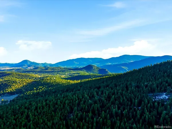 a view of an outdoor space and mountain view