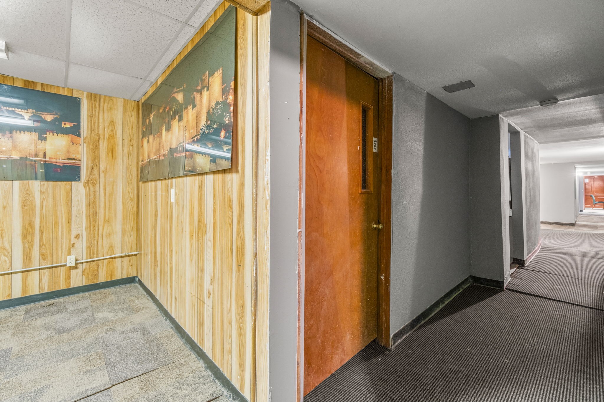 1018 Shaver Street Pasadena, TX 77506 - Photo 17 of 43 Additional office or storage room with wood panel detailing.