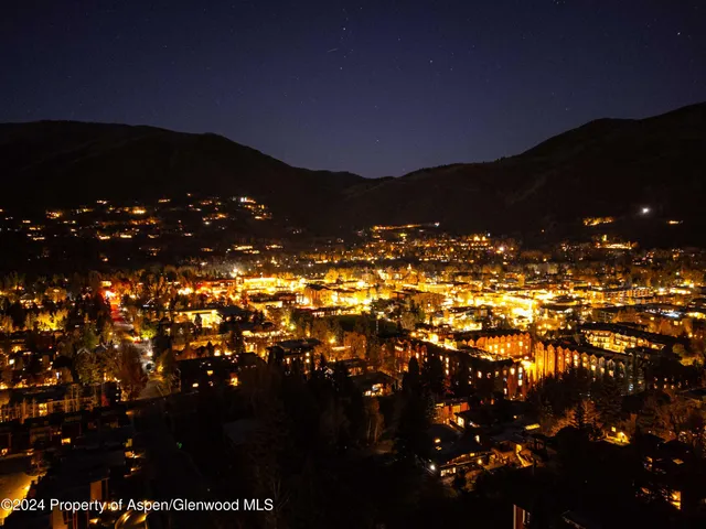 a view of a balcony with chairs