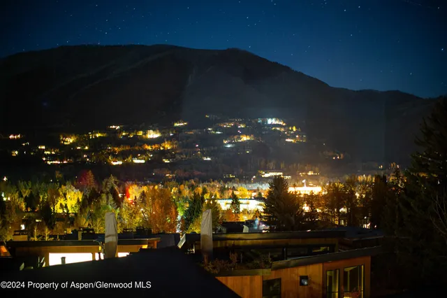 a view of a swimming pool with a lounge chair