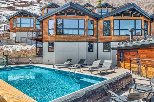 a view of balcony with furniture