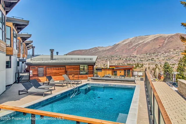 a view of a dinning table and chairs in the patio