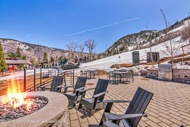 a view of swimming pool with seating area