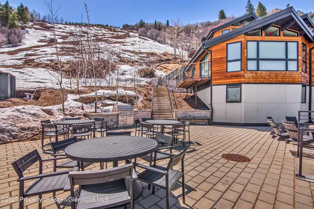 a view of a swimming pool with a lake view