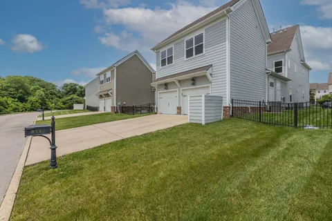 a house view with a garden space
