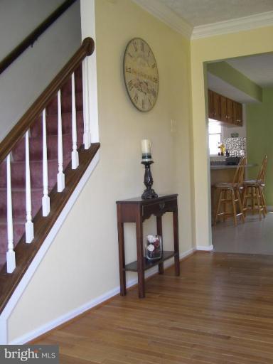 1203 Brookview Road Towson, MD 21286 - Photo 11 of 25 a view of a hallway with wooden floor