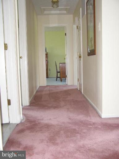 1203 Brookview Road Towson, MD 21286 - Photo 18 of 25 a view of a hallway with wooden floor