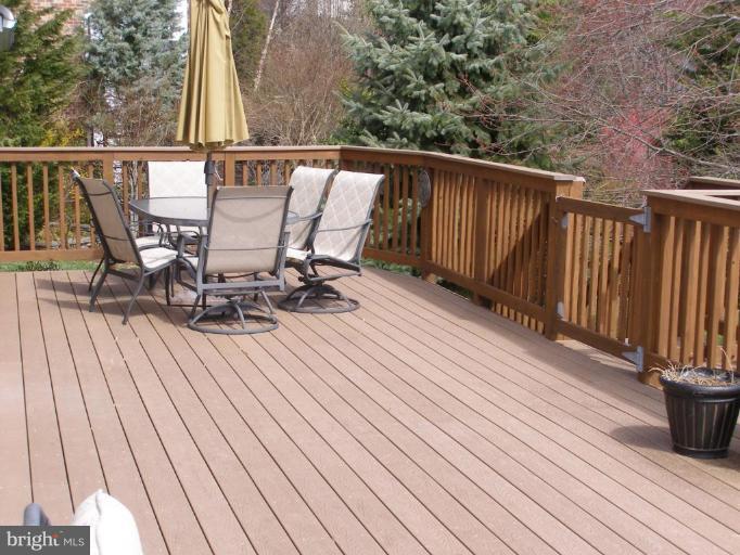 1203 Brookview Road Towson, MD 21286 - Photo 24 of 25 a view of deck with chairs and wooden floor