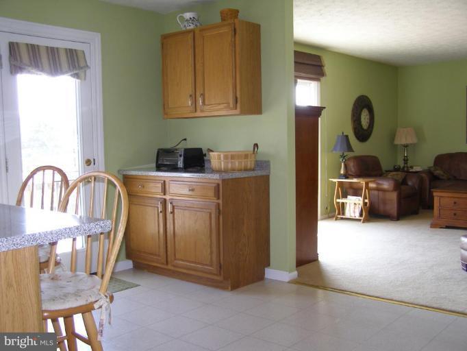 1203 Brookview Road Towson, MD 21286 - Photo 4 of 25 a view of a kitchen from a dining room