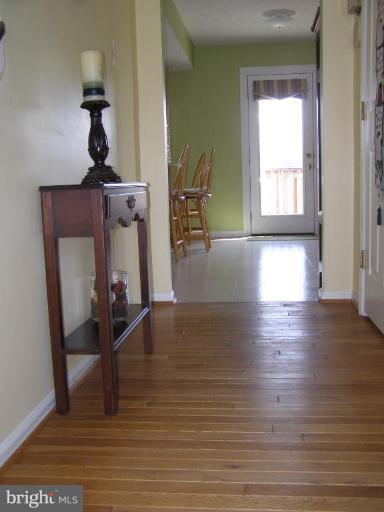 1203 Brookview Road Towson, MD 21286 - Photo 10 of 25 a view of a livingroom with furniture and wooden floor