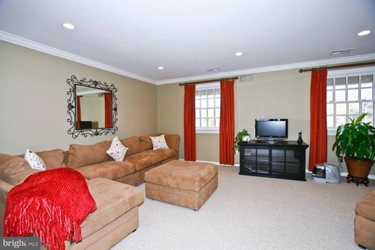 10306 Norton Road Potomac, MD 20854 - Photo 12 of 14 a living room with furniture and a window