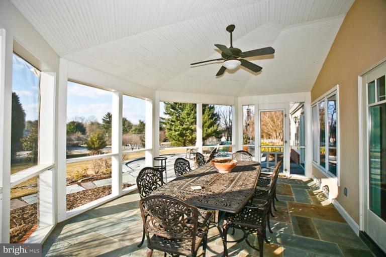 10306 Norton Road Potomac, MD 20854 - Photo 13 of 14 a view of a dining room with furniture window and outside view