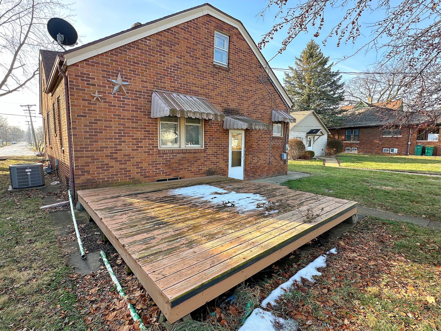 1126 East Main Street Streator, IL 61364 - Photo 21 of 23 a view of a wooden roof deck