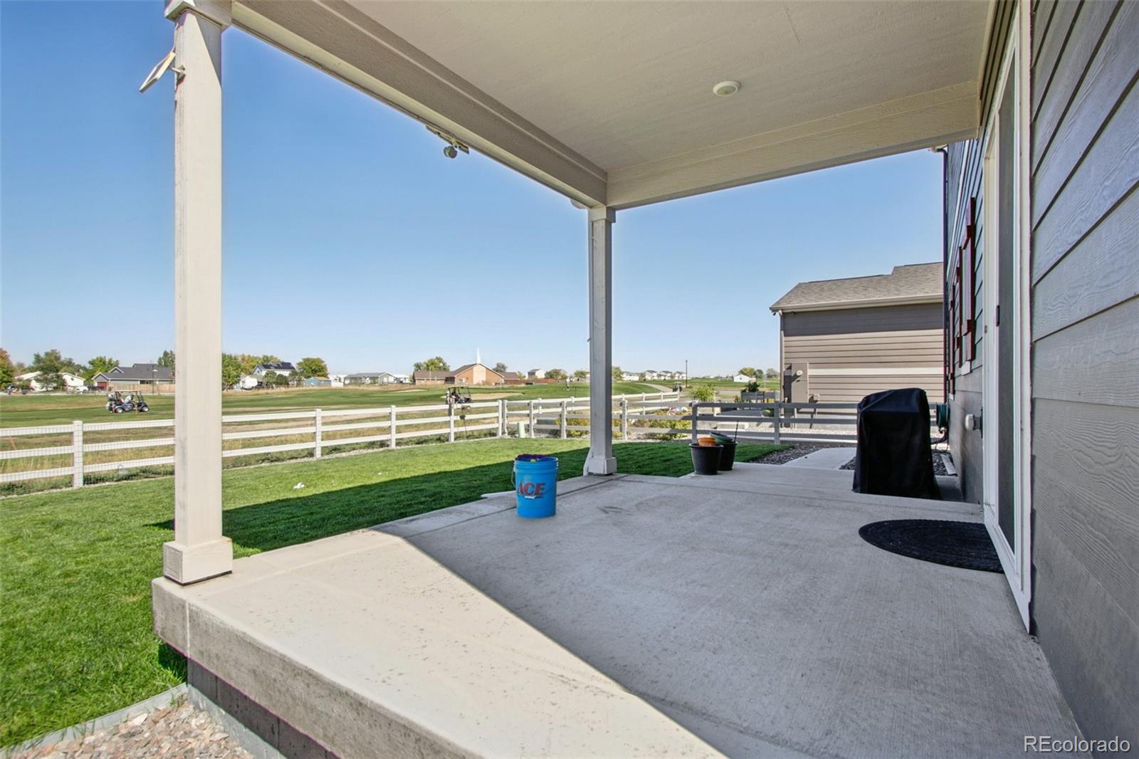 1907 Homestead Drive Fort Lupton, CO 80621 - Photo 39 of 47 a view of a patio with a yard
