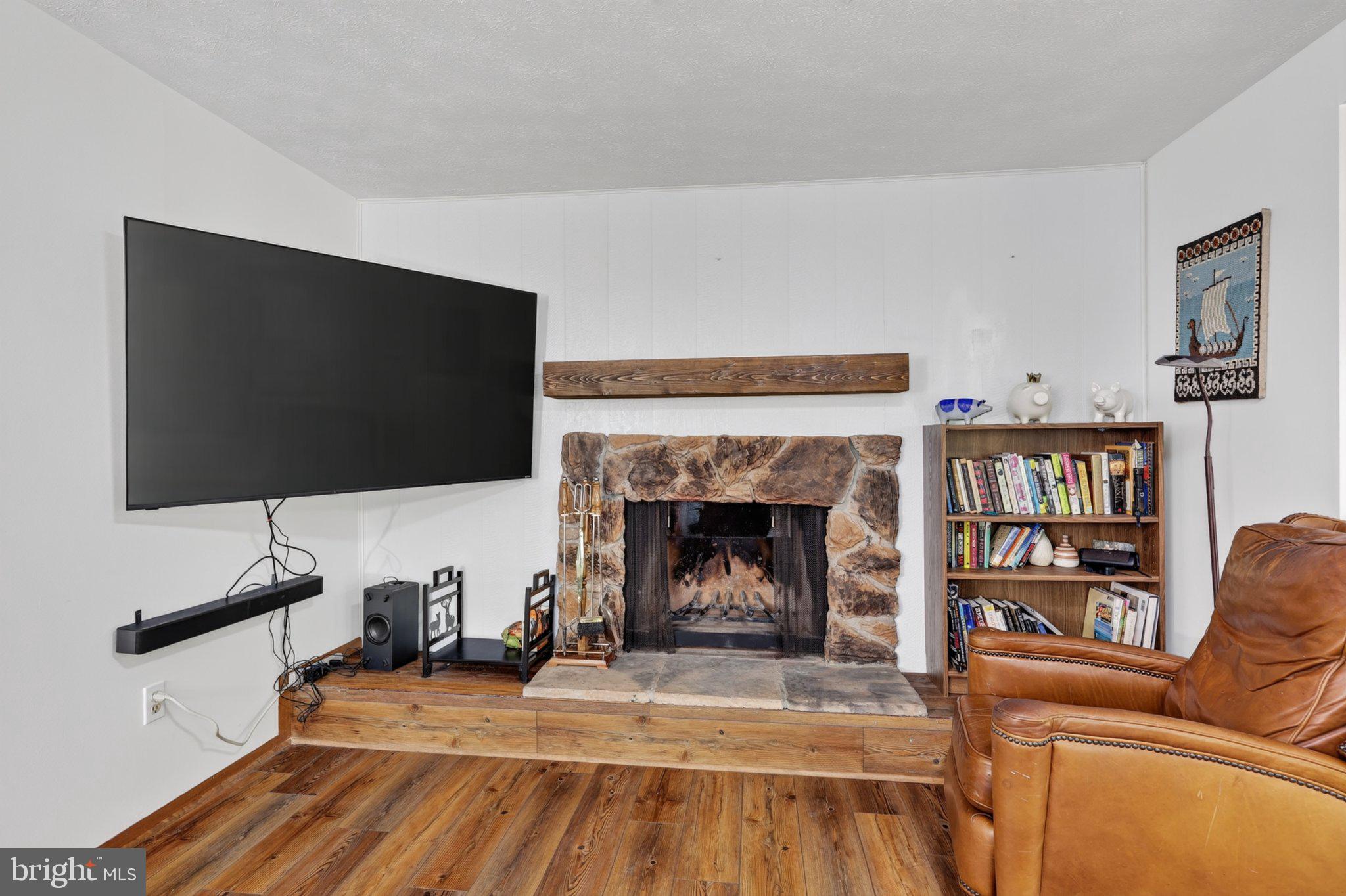 274 The Hill Road, Unit 13A Basye, VA 22810 - Photo 8 of 12 Cozy living space with rustic charm.
