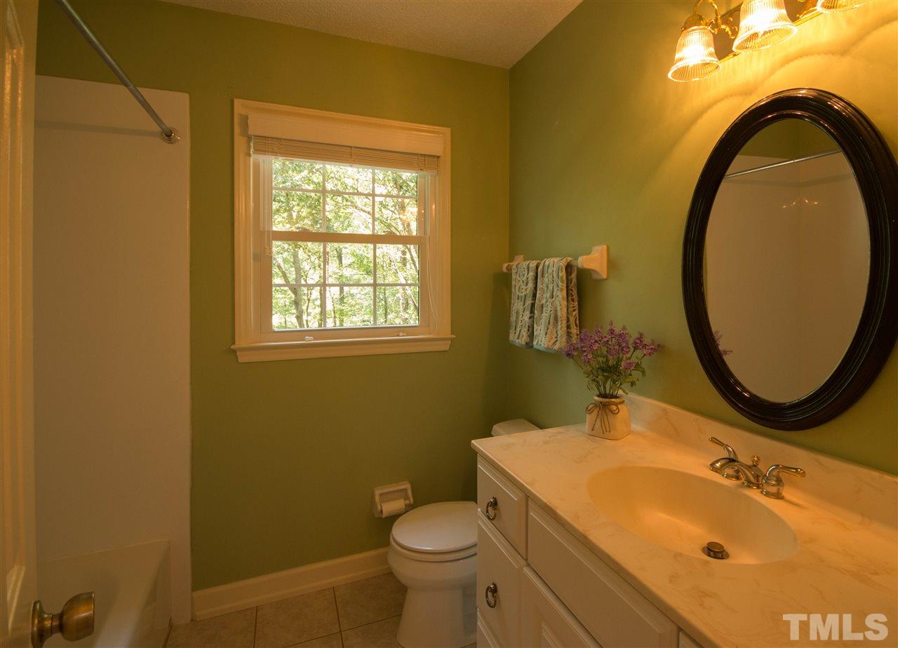 7626 Herndon Road Durham, NC 27713 - Photo 19 of 25 Also has ceramic tile floor.