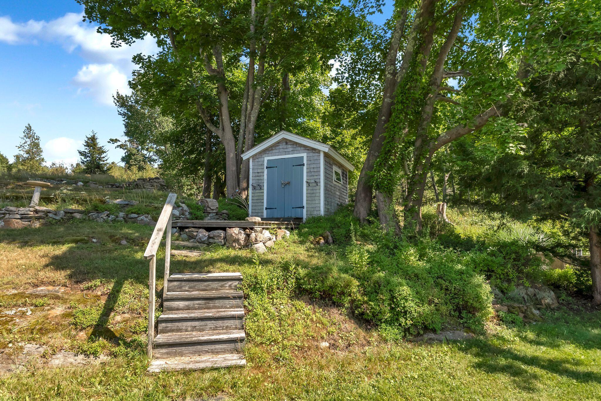 77 Lowells Cove Road Harpswell, ME 04066 - Photo 9 of 32 Shed with raised deck
