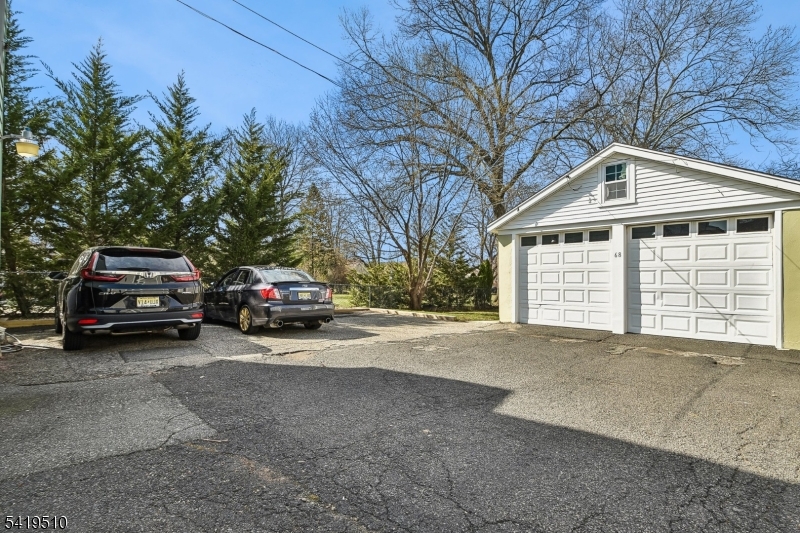 68 North Street, Unit 2 Madison, NJ 07940 - Photo 15 of 18 a view of a car parked in front of a house